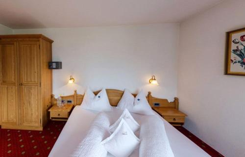 Postel nebo postele na pokoji v ubytování Hotel Tonnerhof