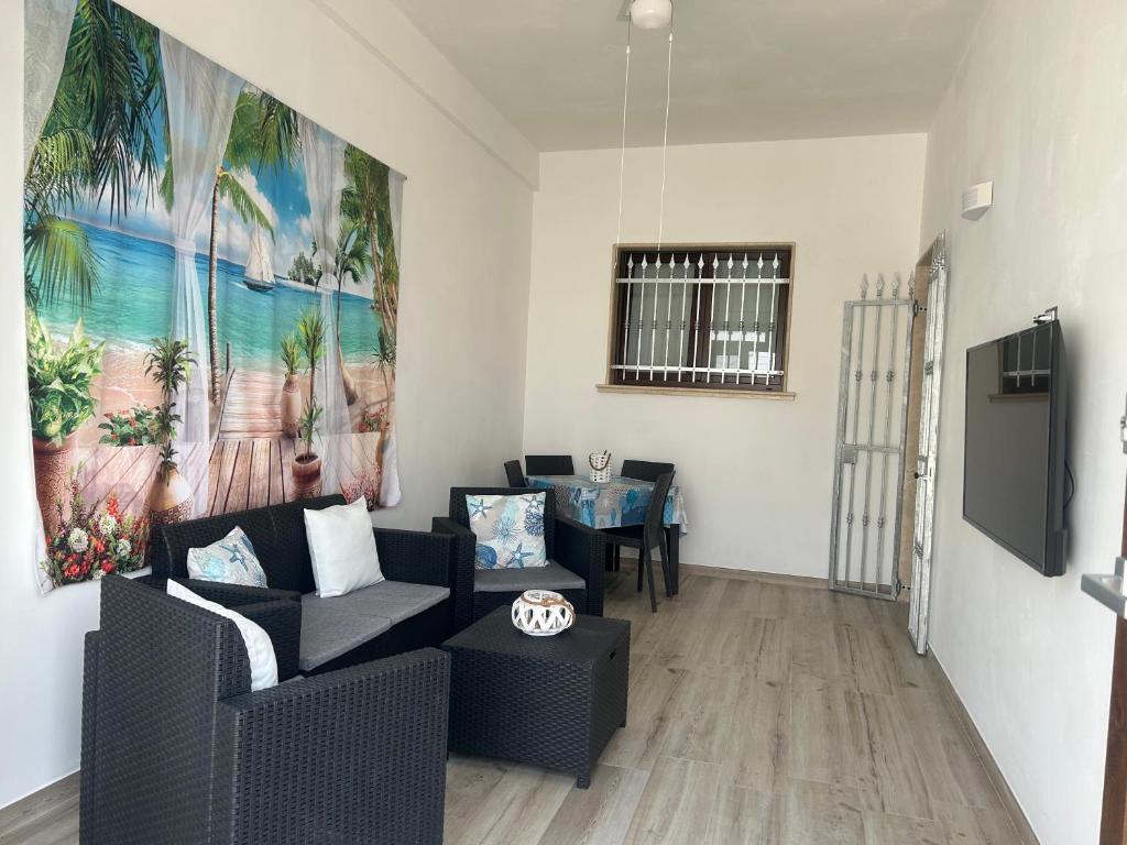 TV a/nebo společenská místnost v ubytování Casa vacanze Nina