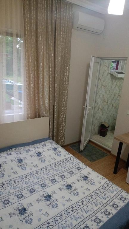 Llit o llits en una habitació de Hotel Prince