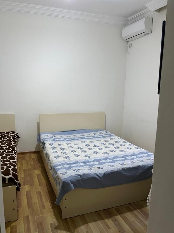 Llit o llits en una habitació de Hotel Prince