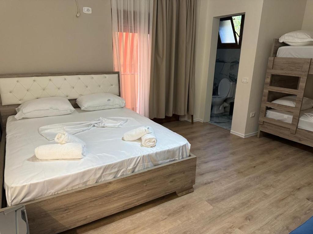 Postel nebo postele na pokoji v ubytování Voyage Villa