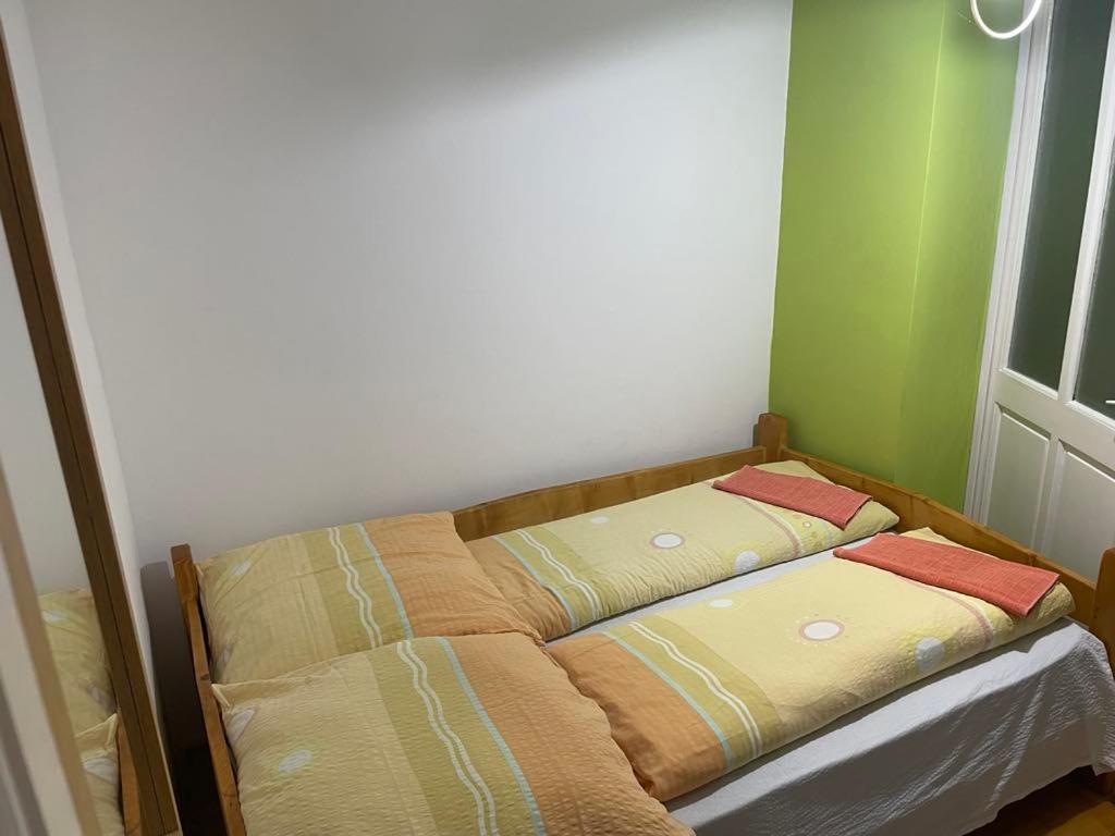 Postel nebo postele na pokoji v ubytování Góbé Vendégház
