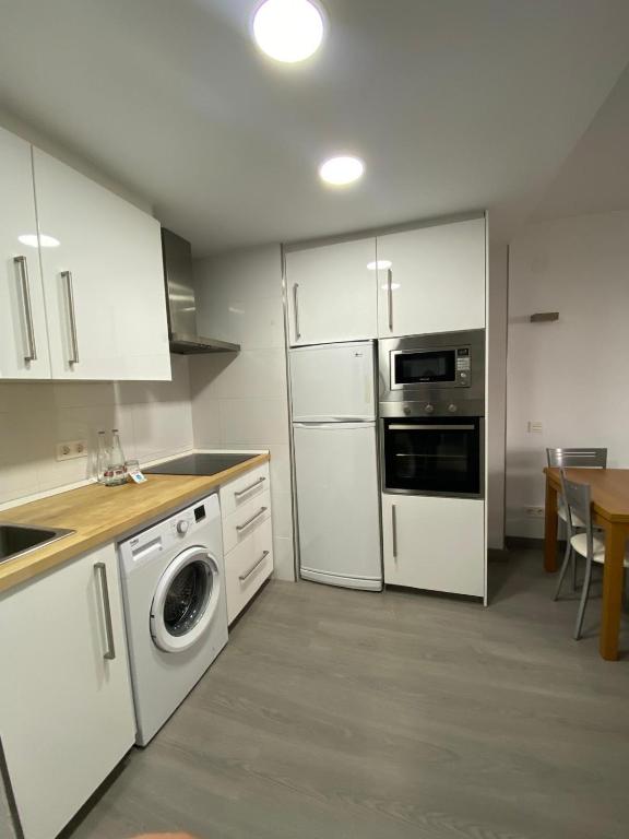 Kuchyňa alebo kuchynka v ubytovaní Apartamentos Chinasolymar