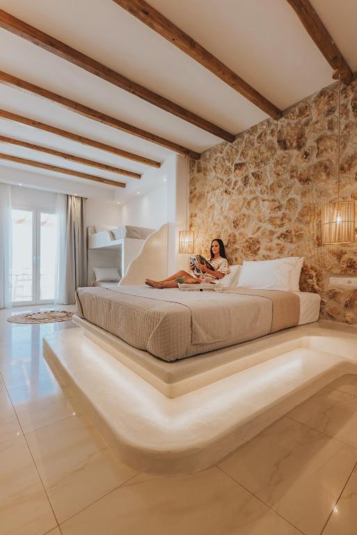 Postel nebo postele na pokoji v ubytování Naxos Grand Hotel