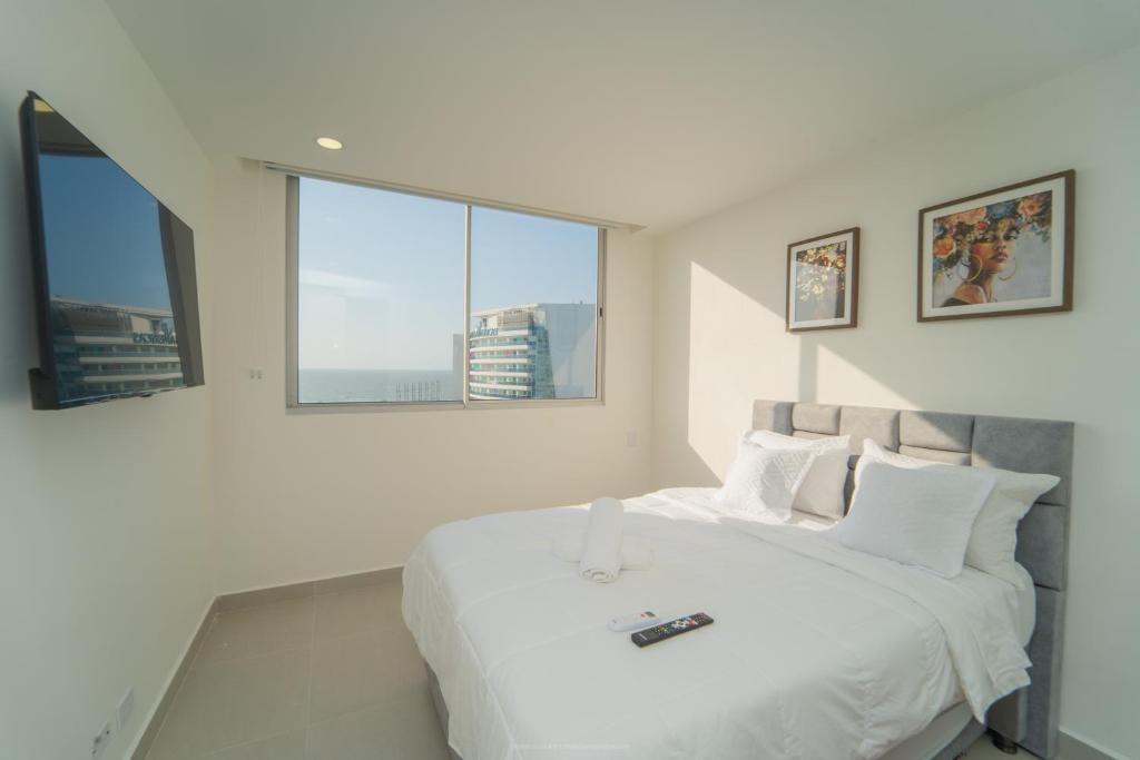 Postel nebo postele na pokoji v ubytování Encanto Rentals at Sunno Beach