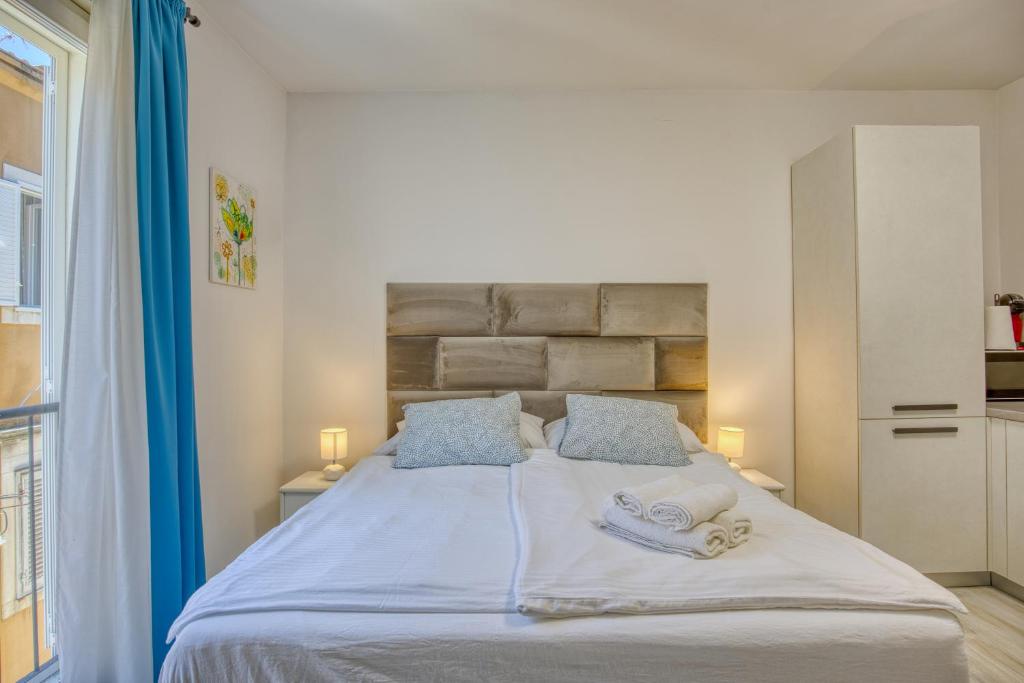 Posteľ alebo postele v izbe v ubytovaní Guest House Arsenal Accommodation