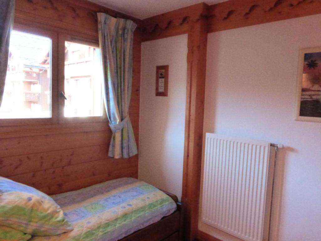Zdjęcie z galerii obiektu Résidence Fermes De Meribel Bat C - Confortable appartement 3 pièces pour 4 personnes aux pieds des pistes aves accès à la piscine situé à Meribel Village MAE-1800 w mieście Les Allues