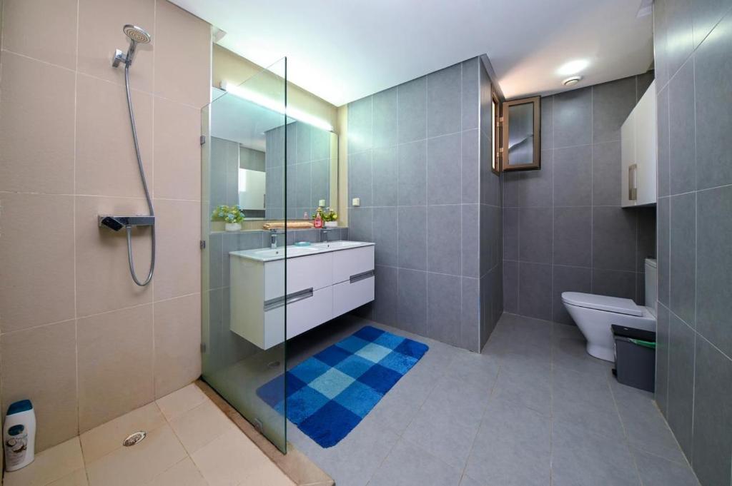 Ванная комната в Tamraght golf sea view , pool, beach access