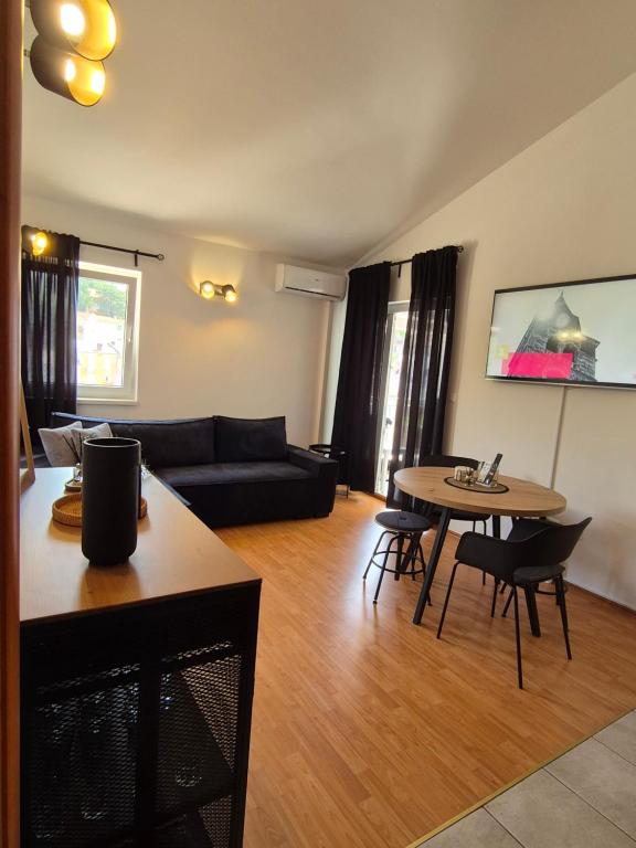 Posezení v ubytování Tia, studio apartman