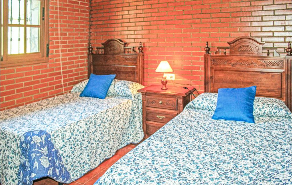 Posteľ alebo postele v izbe v ubytovaní Awesome Home In El Gastor