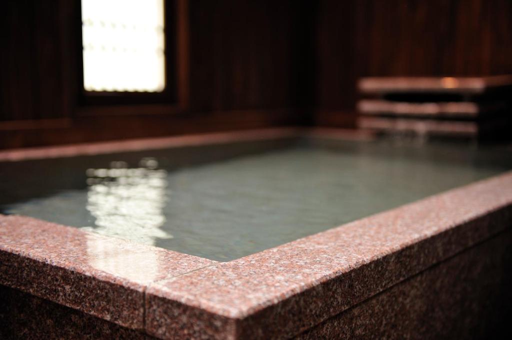 Bazén v ubytování Hakone Onsen Ryokan Yaeikan nebo v jeho okolí