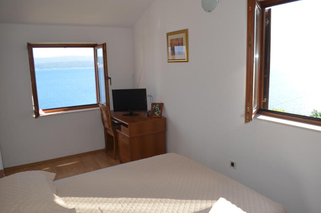 Televízia a/alebo spoločenská miestnosť v ubytovaní Holiday Villa in Omiš