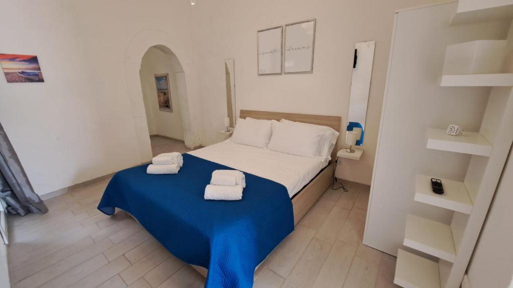 Giường trong phòng chung tại Borgo28