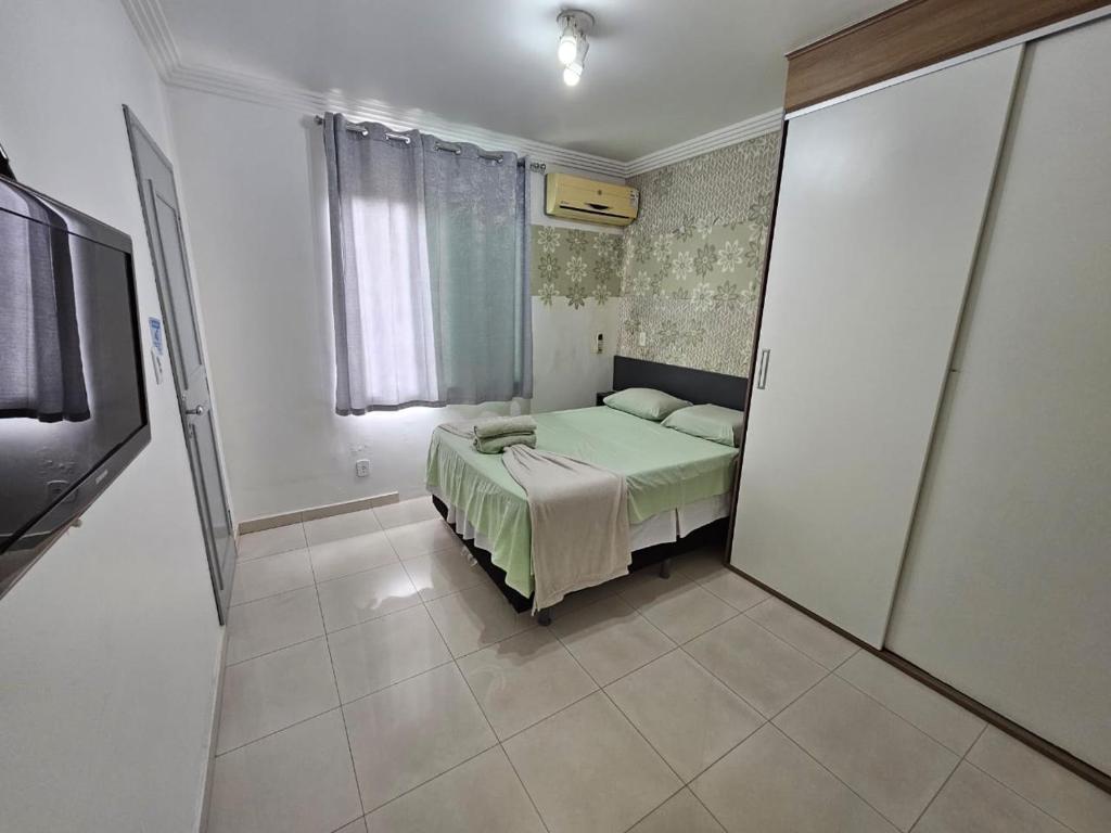 Postel nebo postele na pokoji v ubytování Pousada 218 Manaus