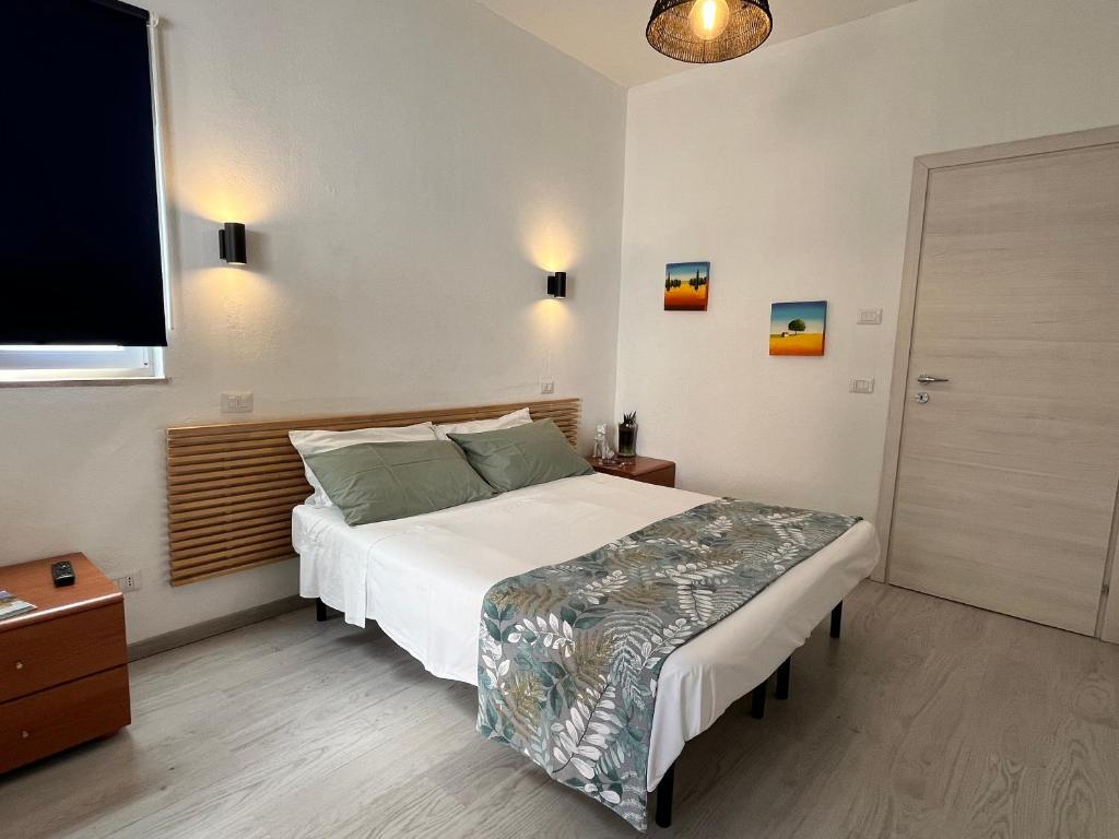 Postel nebo postele na pokoji v ubytování DMC - Alloggio Turistico