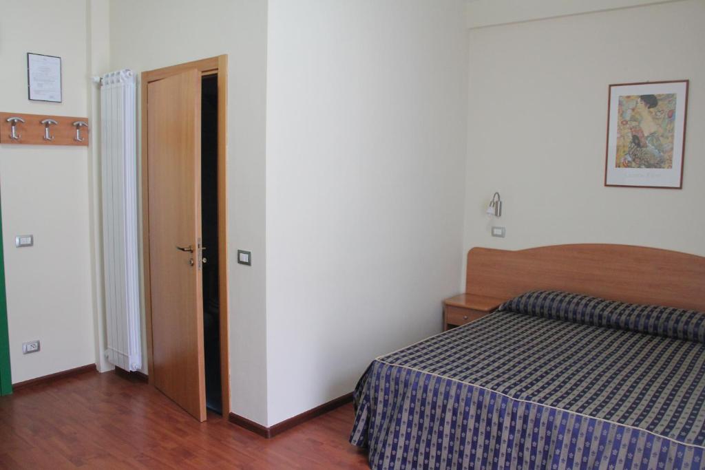 Postel nebo postele na pokoji v ubytování B&B Luna Blu