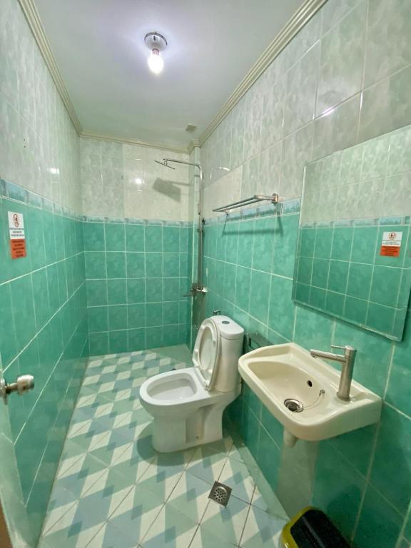 Koupelna v ubytování Jupiter Homestay
