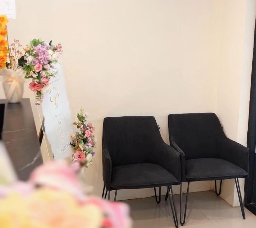 Area soggiorno di Priority Guest House Samarinda