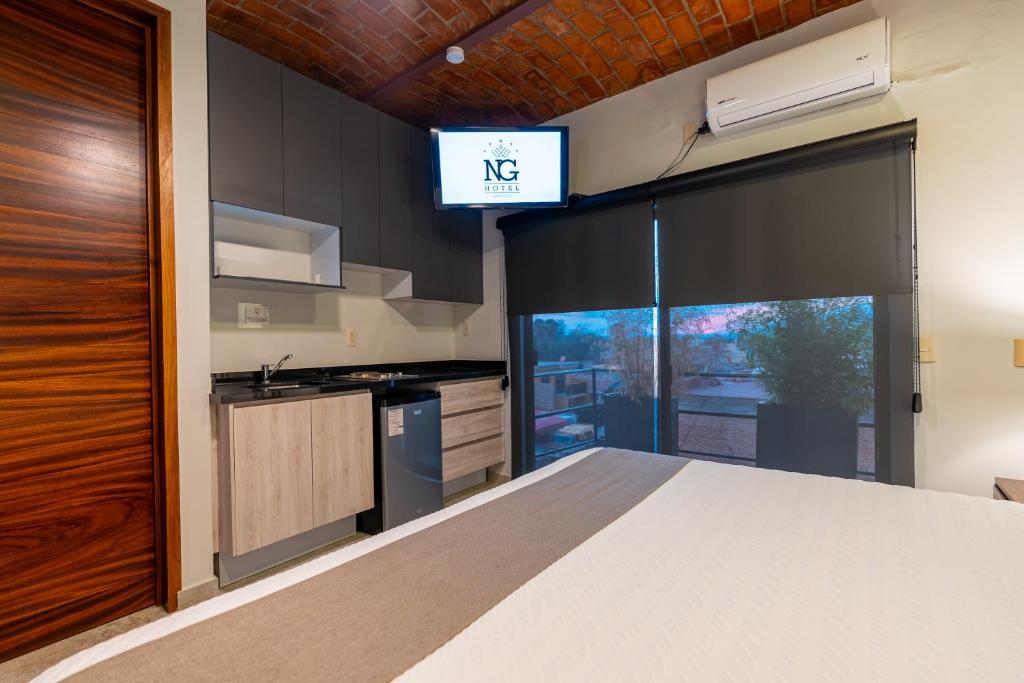 Kuchyň nebo kuchyňský kout v ubytování Hotel NG
