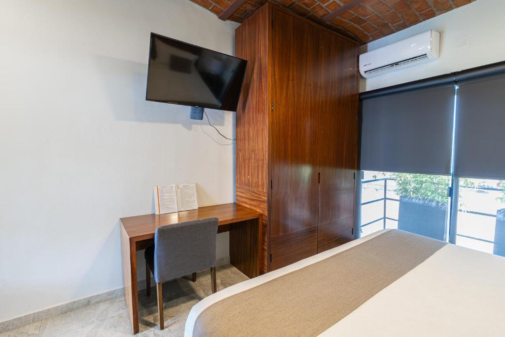 TV a/nebo společenská místnost v ubytování Hotel NG