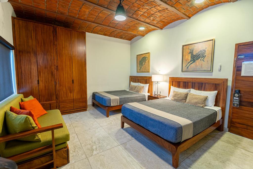 Postel nebo postele na pokoji v ubytování Hotel NG