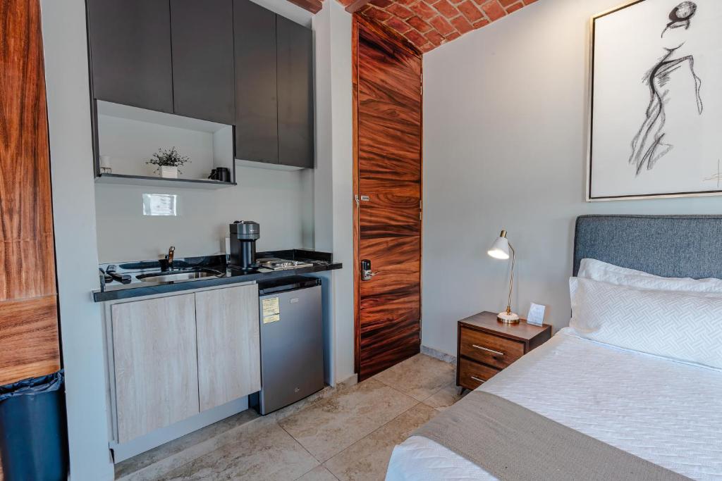 Postel nebo postele na pokoji v ubytování Hotel NG