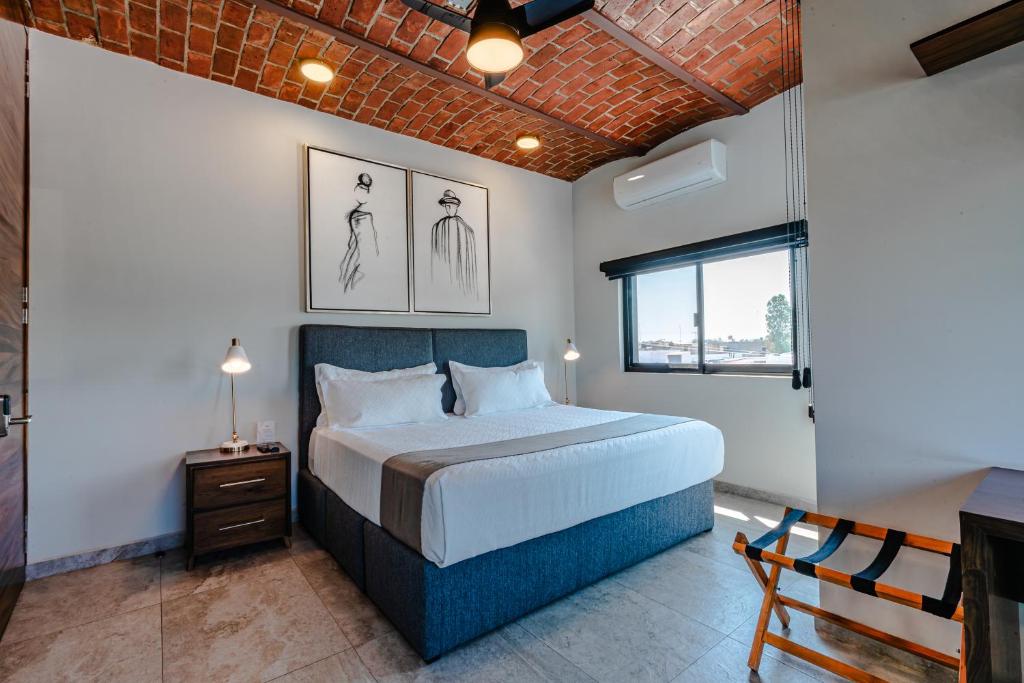 Postel nebo postele na pokoji v ubytování Hotel NG