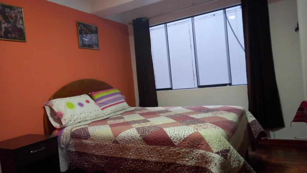 Postel nebo postele na pokoji v ubytování Kaboka Cusco Hospedaje Familiar
