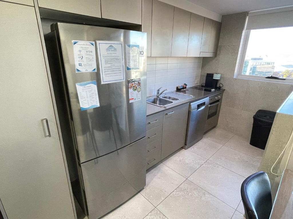 Kuchyň nebo kuchyňský kout v ubytování Honeysuckle Executive Apartments