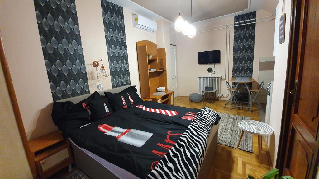 Postel nebo postele na pokoji v ubytování Ágnes Vendégházak Siófok-apartman 2