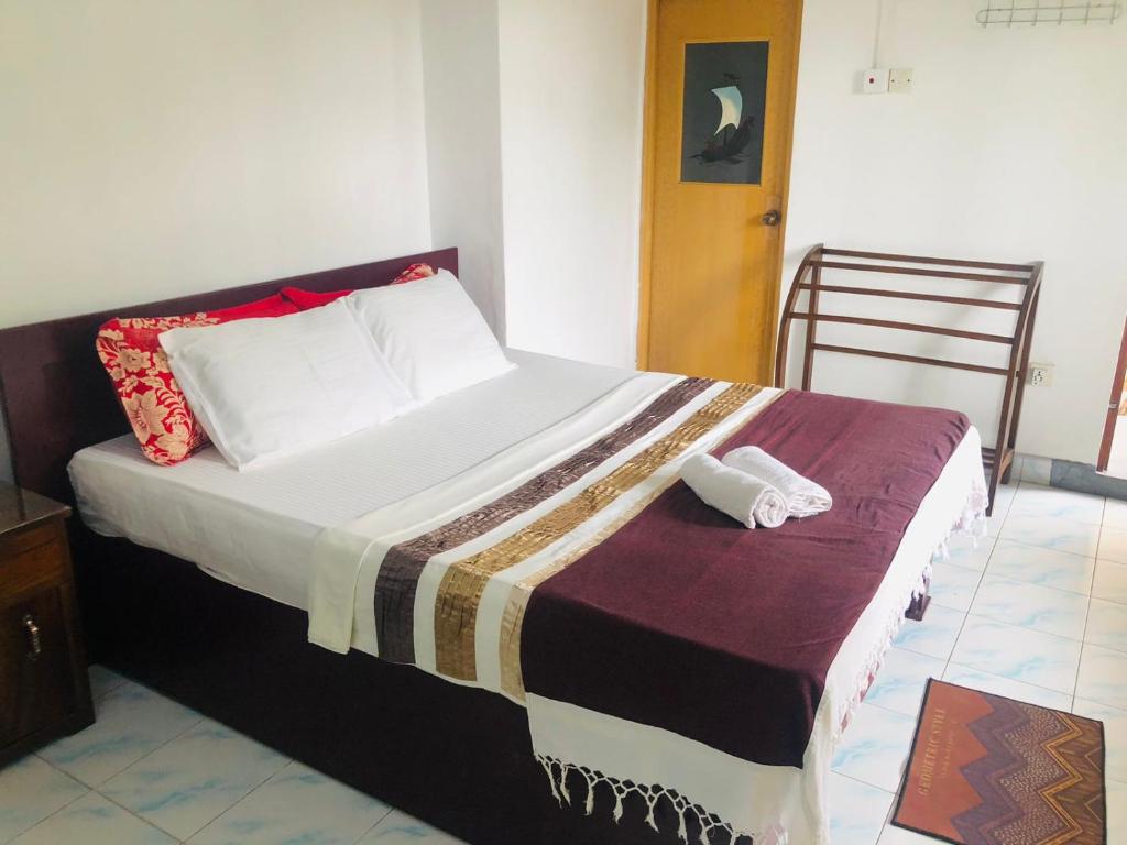 Postel nebo postele na pokoji v ubytování Chandi Mahal HomeStay