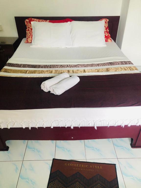 Postel nebo postele na pokoji v ubytování Chandi Mahal HomeStay