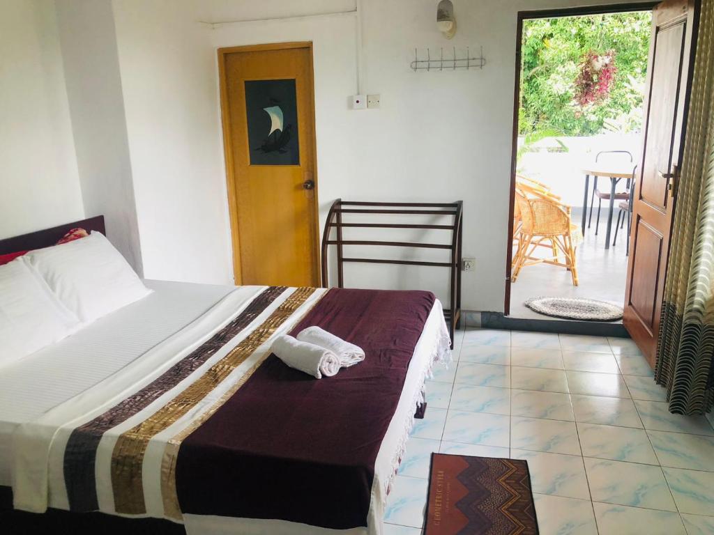 Postel nebo postele na pokoji v ubytování Chandi Mahal HomeStay
