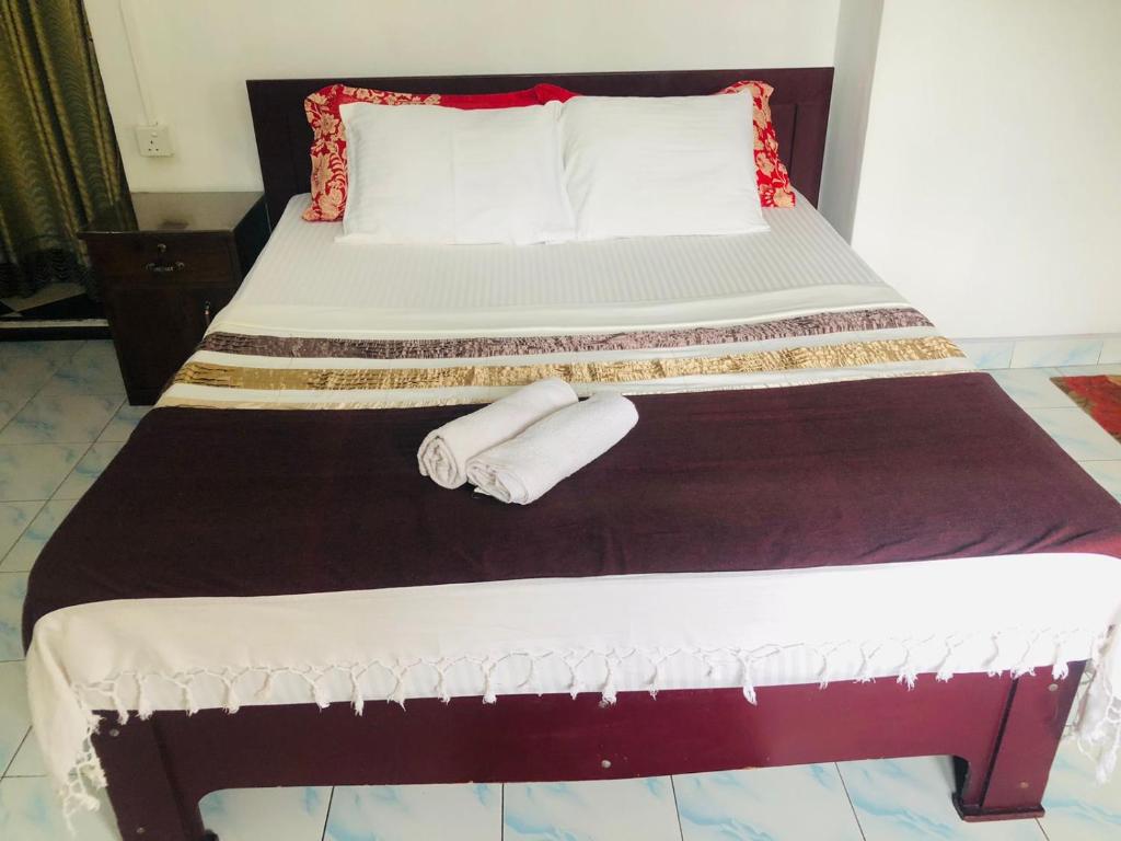 Postel nebo postele na pokoji v ubytování Chandi Mahal HomeStay