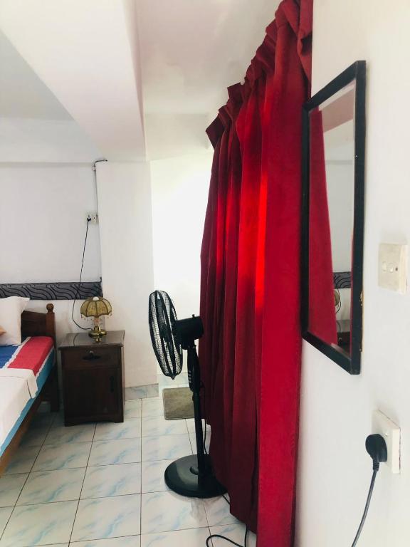 Postel nebo postele na pokoji v ubytování Chandi Mahal HomeStay