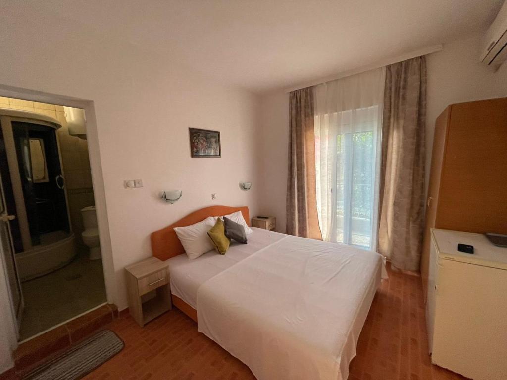 Posteľ alebo postele v izbe v ubytovaní Villa Three Flags Bed & Breakfast