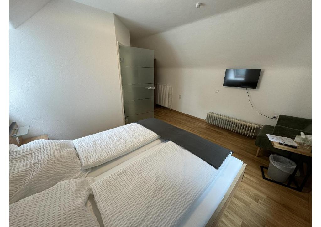 Postel nebo postele na pokoji v ubytování Pension Blockheidehof