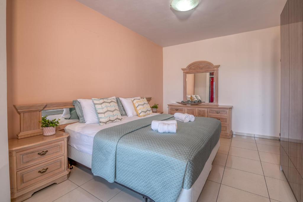 Posteľ alebo postele v izbe v ubytovaní Michael's Villa
