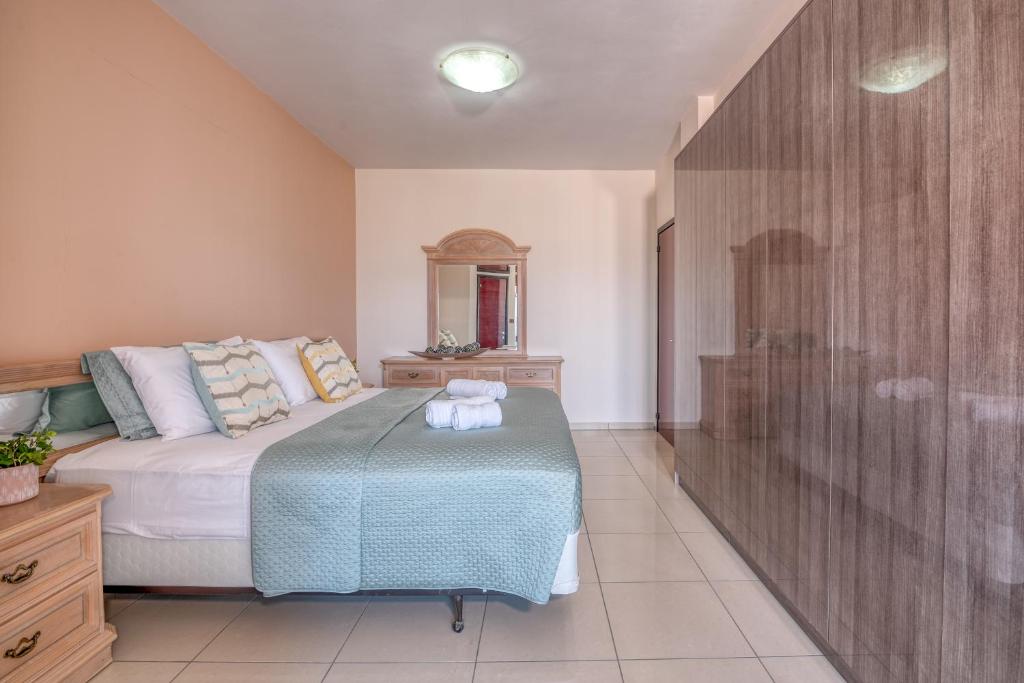 Posteľ alebo postele v izbe v ubytovaní Michael's Villa