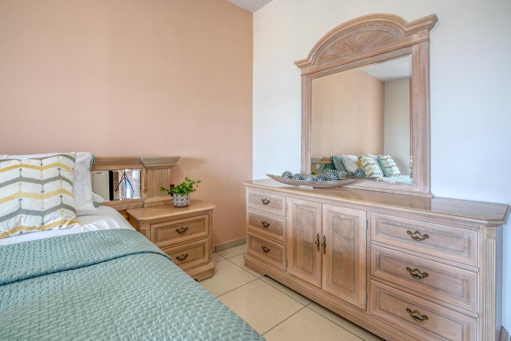 Posteľ alebo postele v izbe v ubytovaní Michael's Villa