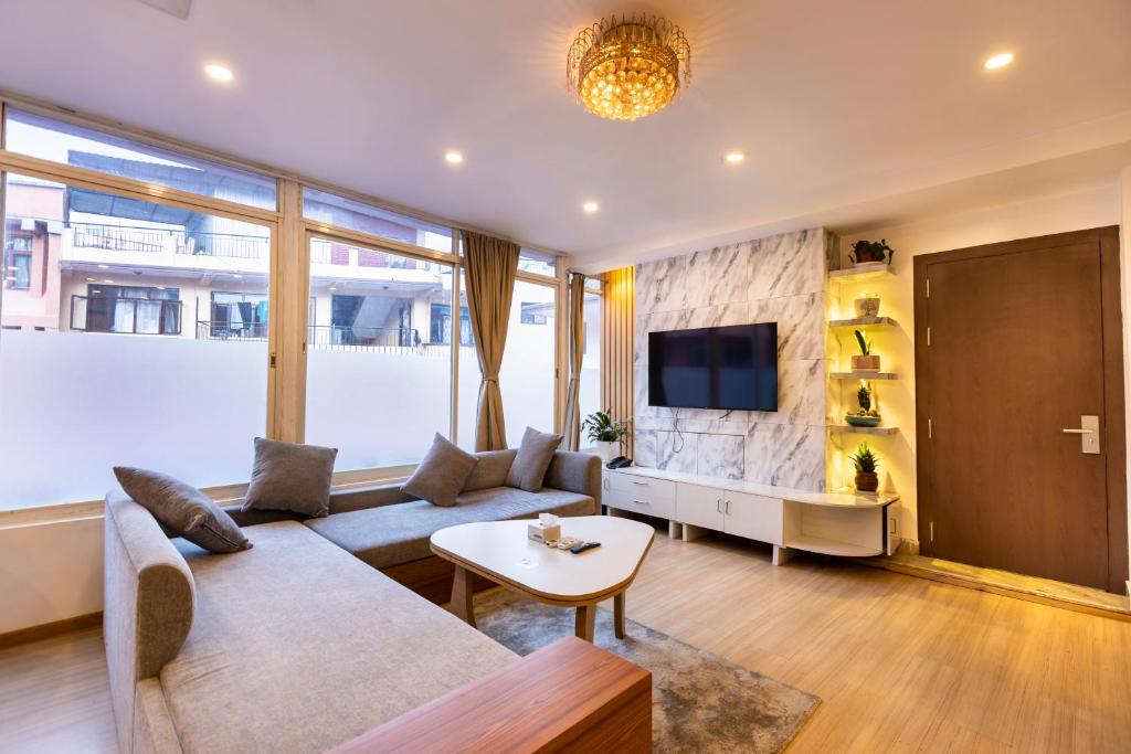 TV a/nebo společenská místnost v ubytování Hotel M Square Pvt.Ltd