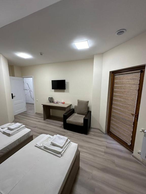 Postel nebo postele na pokoji v ubytování Olive hotel