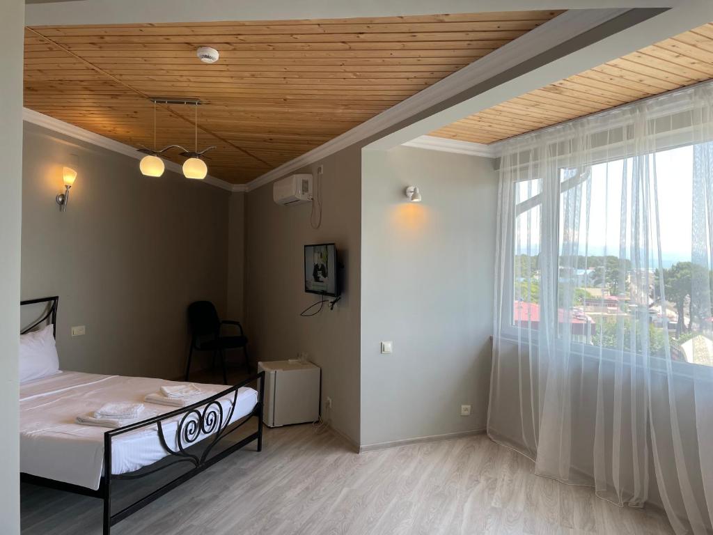 Postel nebo postele na pokoji v ubytování Argo Hotel
