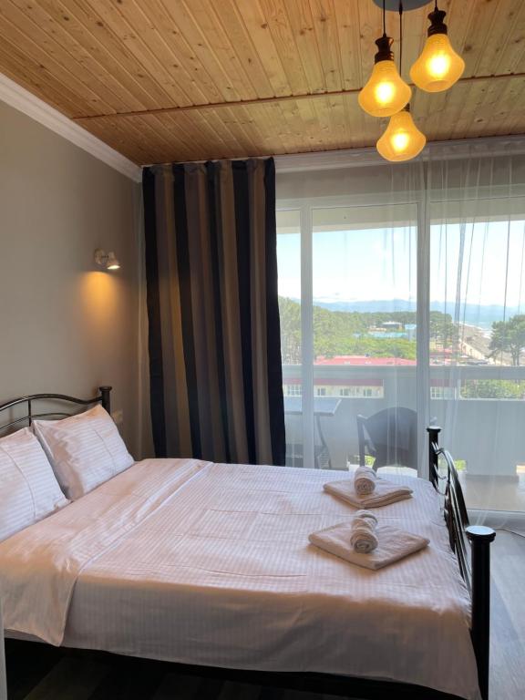 Postel nebo postele na pokoji v ubytování Argo Hotel