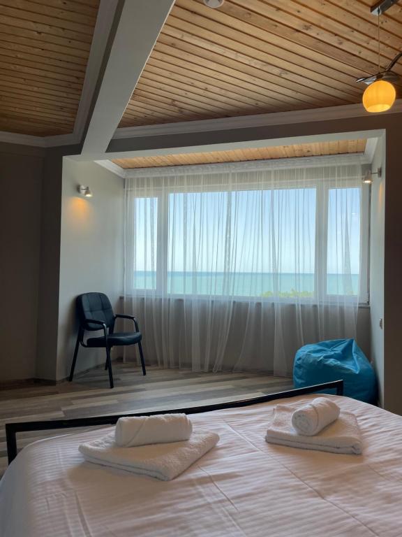 Postel nebo postele na pokoji v ubytování Argo Hotel