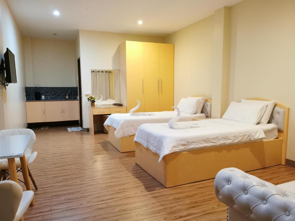 Postel nebo postele na pokoji v ubytování Acrige Apartelle at heart of Bogo City, Cebu