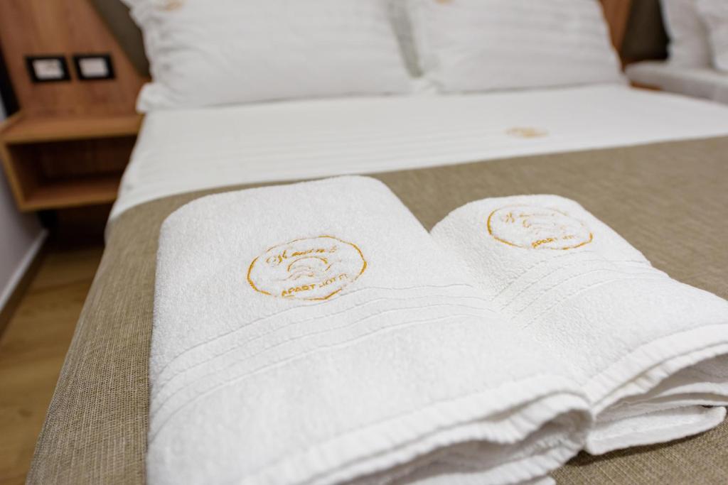 Postel nebo postele na pokoji v ubytování Kevin's ApartHotel