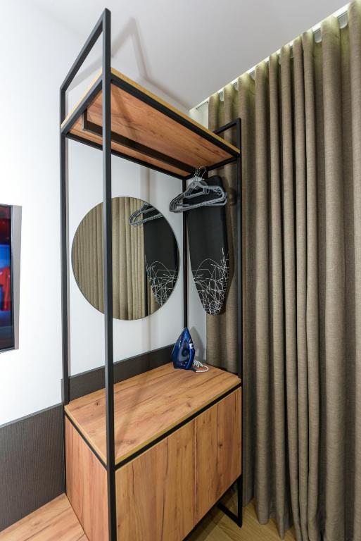 Postel nebo postele na pokoji v ubytování Kevin's ApartHotel