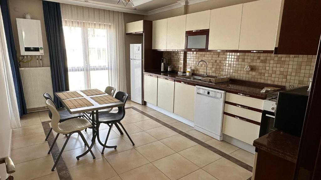 Kuchyň nebo kuchyňský kout v ubytování Corner luxury suit
