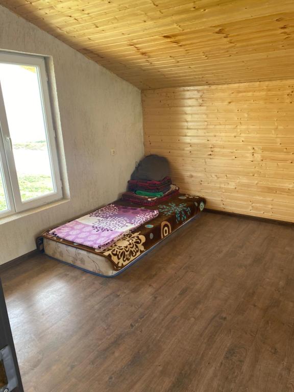 Postel nebo postele na pokoji v ubytování სასტუმრო ქორულდი / Hotel Koruldi